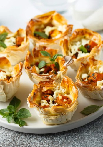 Receta Cestitas de pasta filo con calabaza, speck y taleggio