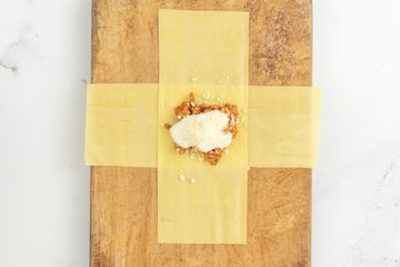 Receta de saquitos de lasaña al horno: preparación 8