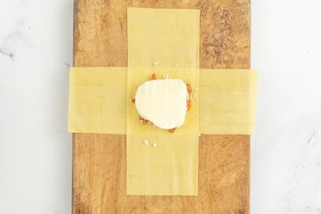 Receta de saquitos de lasaña al horno: preparación 9
