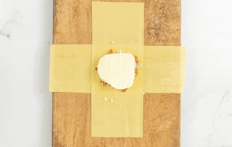 Receta de saquitos de lasaña al horno: preparación cierre