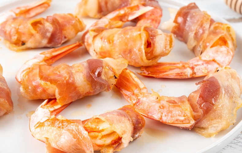 Receta de langostinos envueltos en panceta